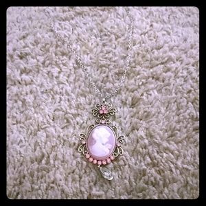 Pink silhouette pendant necklace